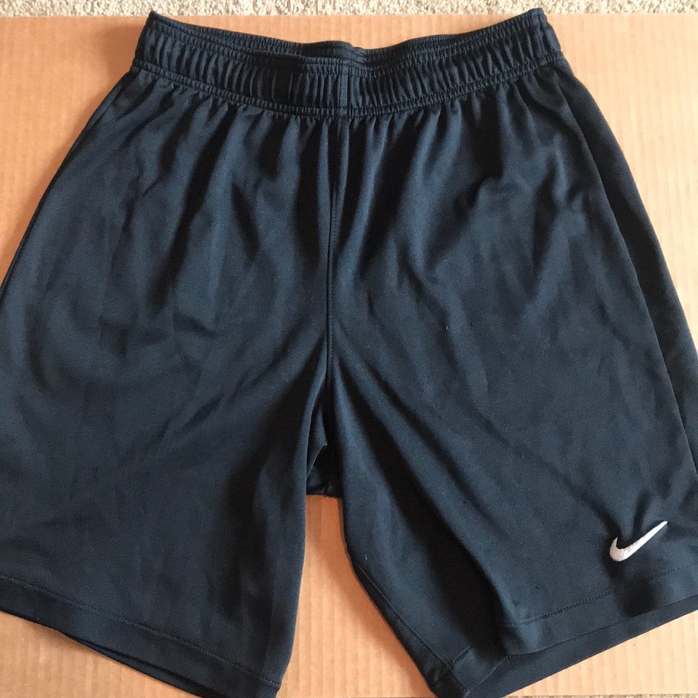 Black Nike soccer shorts.
